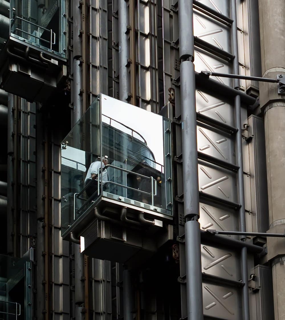 a photo of a lift service specialist at work