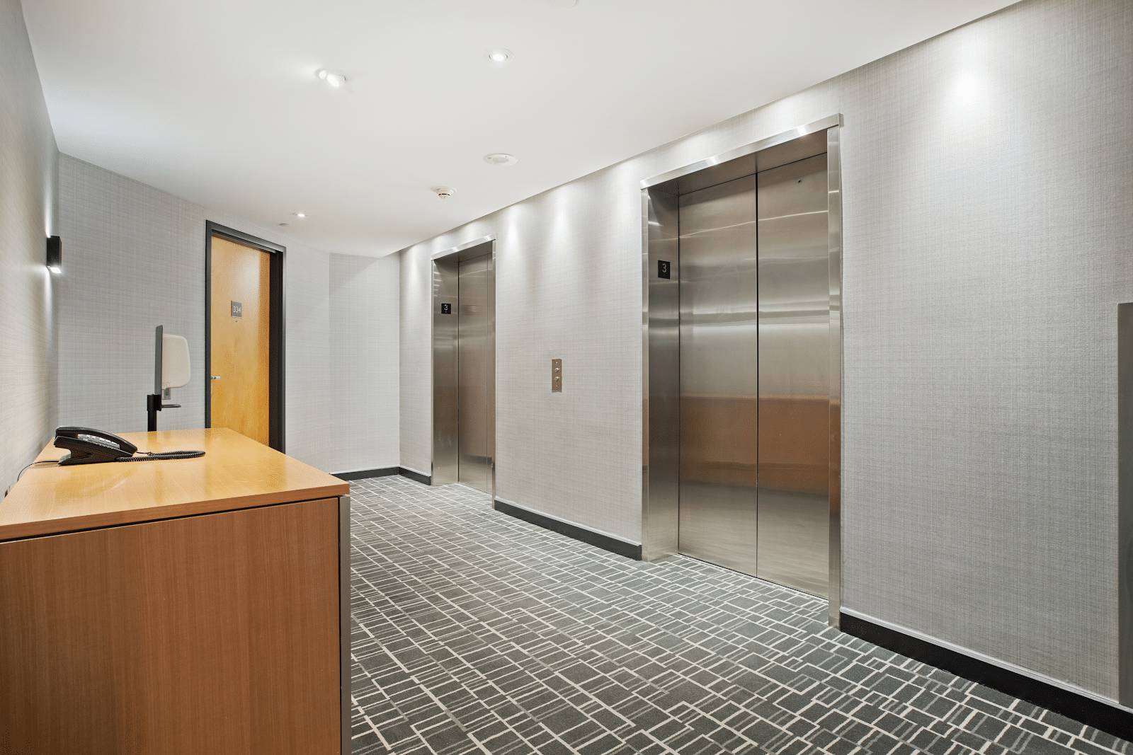 a hallways with lift doors