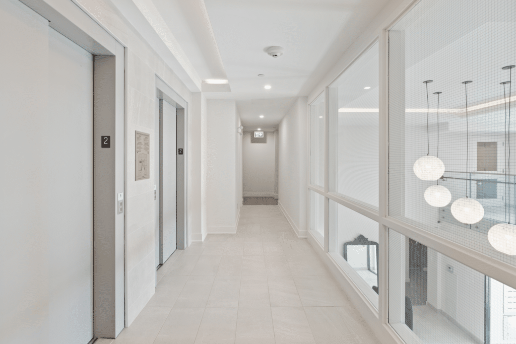 a hallway with lift doors