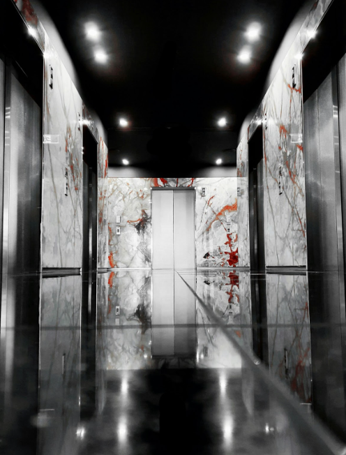 lift with red marble walls