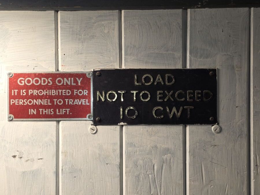 Goods only sign on a pub service lift